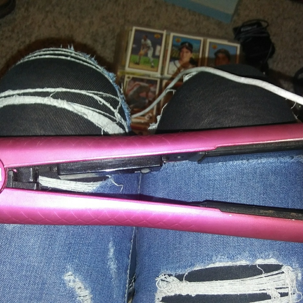 Pink Revlon hair straightener and flat iron